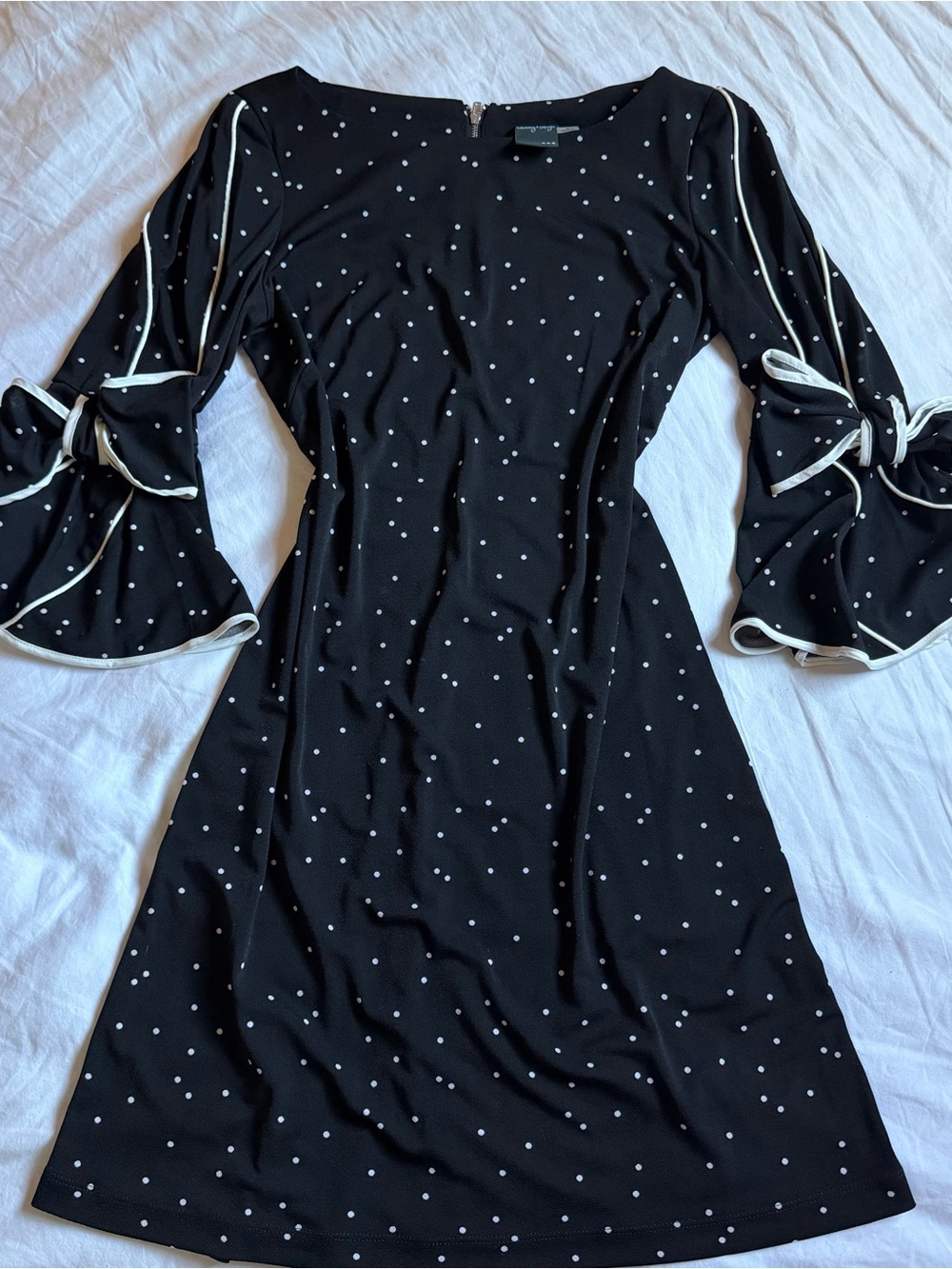 black/white polkadot mini dress with bow sleeves
